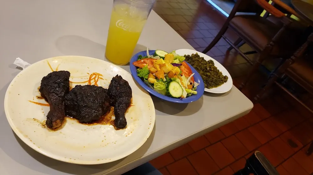 Jerk Chicken with Side Salad and Callaloo